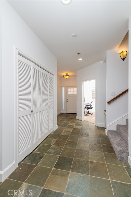 Laundry closet located downstairs.