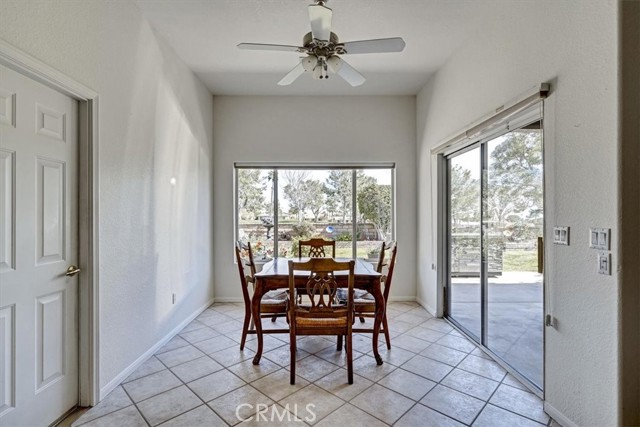 Breakfast Nook. Cart Garage to The Left. Double Fairway View Straight Ahead. Covered Patio To The Right Thru The Sliding Door.