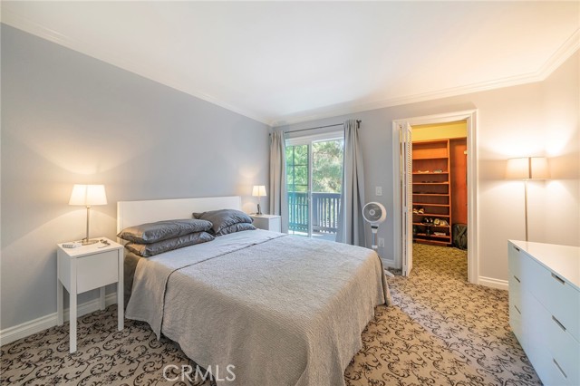 Your bedroom with sliding door for evening breezes and morning birds chirping. The walk-in closet is spacious and comfortable.