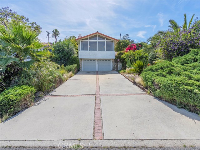 2-car garage with expansive driveway