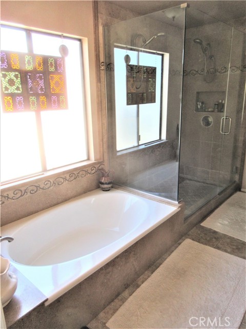 Master Bathroom with Tub and Shower