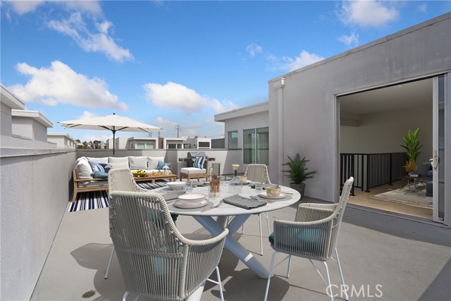 Roof top deck virtually staged.