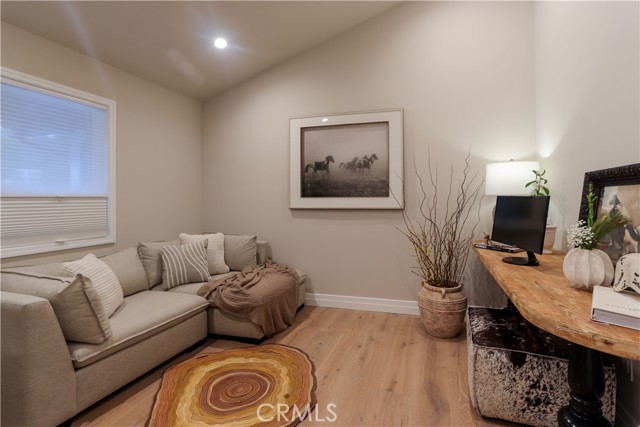 The entry level flex-space is currently stage as a game or family room. It can also easily be a sixth bedroom, which would make three entry-level bedrooms.