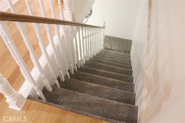 Stairs leading down to the laundry room