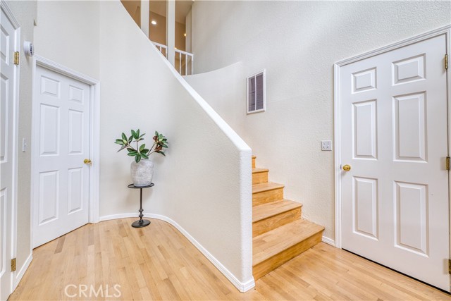 Entry with stairs leading to the living area