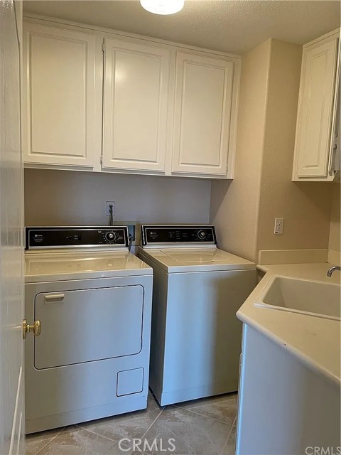Laundry room with utility sink
