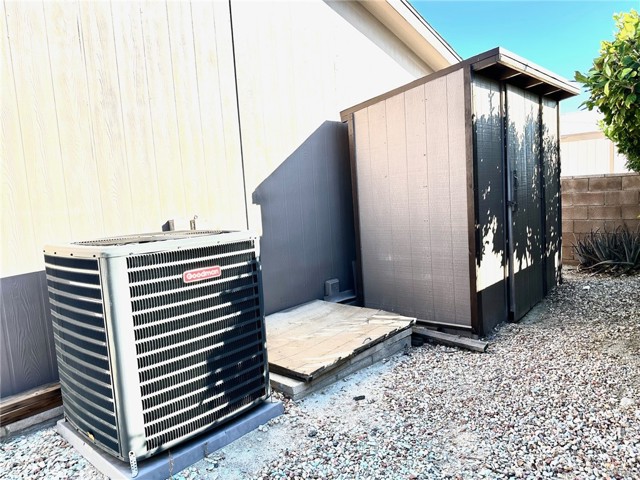 New A/C unit, storage shed