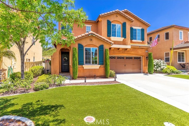 Are you tired of looking at ugly houses? Come check out this South Temecula home. It is adorable! Clean and cute, meticulously maintained and brimming with designer touches everywhere. Welcoming front entrance makes you feel right at home. Downstairs front bedroom is currently being used as a home office which is perfect with the big view windows that have window tinting for cool afternoons. Also works great as a very private guest room. Cozy family room with fireplace has an indoor outdoor living space through the sliding glass door. Step into the modern kitchen with stone countertops and backsplash, farm sink, white epoxy cabinets, large island and big dining area. This home has tons of storage and feels so much bigger than it is. Upstairs the Primary suite is extra large, the hall ways are large, the secondary bedrooms are big enough for real bedroom furniture and the laundry room has storage shelves for extra convenience. Paint and fixtures throughout are neutral and modern. The backyard really makes this home special. In addition to the covered outdoor living section, there is a huge outdoor kitchen gazebo. Everything you see is included! TV, BBQ, and electric heaters all included! Party table and chairs, fan, mini-fridge all included! Front and back yards have artificial turf so you can spend your weekends entertaining instead of doing chores! Hill side is covered in bright friendly yellow flowers and fluffy green bushes. All of this in the highly desirable Redhawk community of Temecula! And you get the nationally ranked GREAT OAK HIGH SCHOOL boundary. High School students can even walk to campus!! Enjoy Pechanga fireworks this 4th of July in your new neighborhood. Please plan to see this one as soon as possible so you can stop looking at ugly houses!