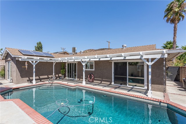 Covered patio area with access from dining and living rooms.