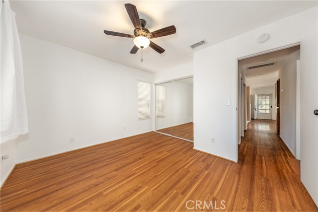 Second Bedroom with Ceiling Fan & Mirrored Wardrobe Doors