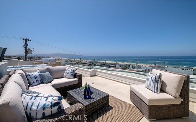 Looking south from roof top fireplace, dry sand and white water all the way down