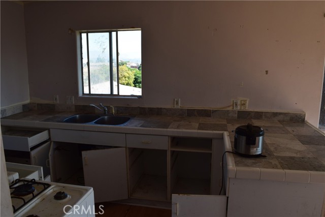 Kitchen in GAME ROOM area
