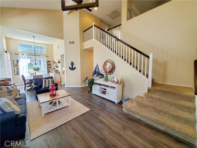 Another view of the living area and stairs