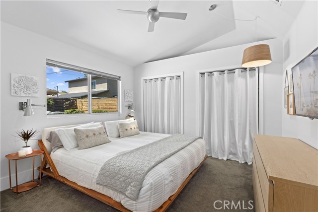 Dual closets with high ceilings.