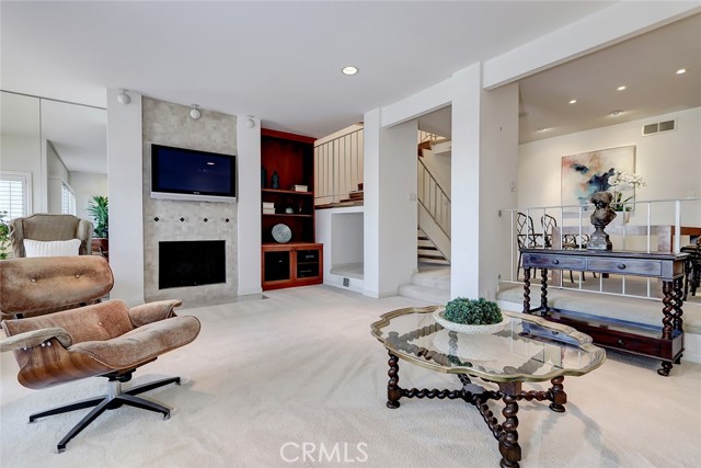 with fireplace and built in storage!