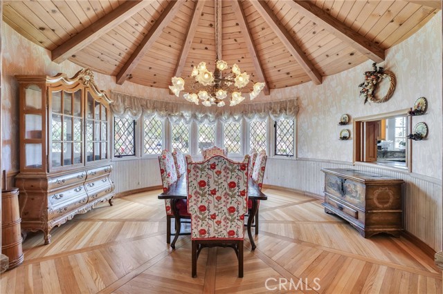 The formal dining room is truly dramatic