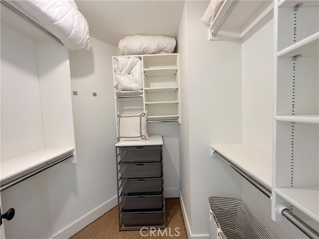 One of two large closets in primary bedroom.