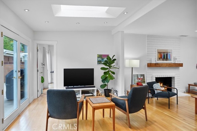 Second living room with french doors to the backyard.