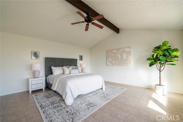 Primary Bedroom with vaulted ceiling