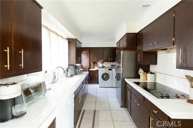 715 E McFadden, Santa Ana CA: https://media.crmls.org/medias/1dd75ff8-d313-4a44-8bce-1fc00b85845a.jpg