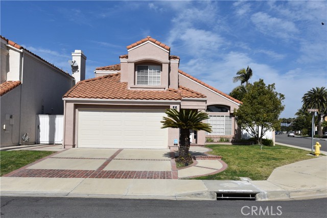 2 Corriente Irvine, California Beautiful vaulted ceiling home located in highly desirable Westpark Community with 4 bedrooms, 3 bathrooms, with 1 bedroom and full bath downstairs. The open floor plan includes a formal living and dining room. The family area has a separate eating area with a cozy fireplace. The high ceiling is accentuated by a skylight which brings natural light to open the room. The kitchen boasts quartz countertops, Stainless-steel appliances including oven, dishwasher and a range hood.The high quality Vinyl flooring downstairs, and the carpet upstairs and a full fresh coat of paint. The master suite includes a walk-in closet, dual vanities, built-in bathtub, and separate shower with skylight. Laundry room includes the washer/dryer. Additional storage space beneath the stairs, attached is a 2-car garage with direct access to the home. The landscaped backyard includes grass and mature fruit trees. The community offers resort style pools, parks, tennis courts and playgrounds. In an Award-winning school district and near UC Irvine. The drive to fine dining, shopping, entertainment is just a few minute’s drive away. Nearby access to HWY 5, 55 & 405.