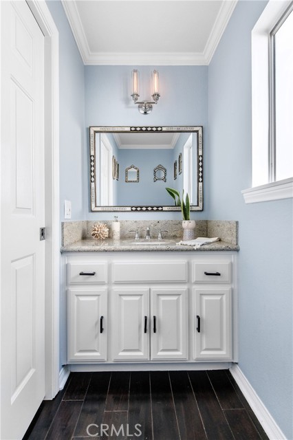 Dreamy powder room is directly off the living-dining-kitchen.