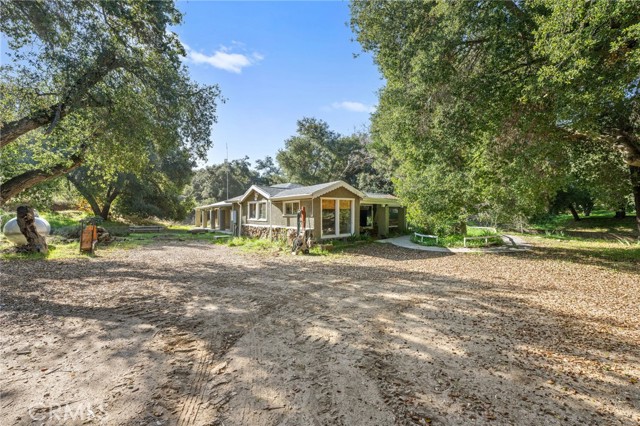 The secondary, creek house, has 1670 square feet of living space. 3 bedrooms, 2 bathrooms,3 outdoor patios and lots of privacy.