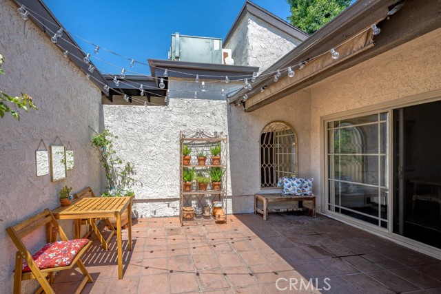 View of private yard space with direct access to the dining area.