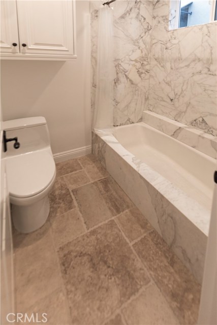 Downstairs bathroom with Carrera marble