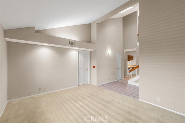 Living room with door to office/bedroom 3