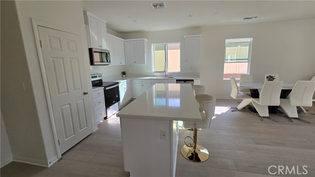 Detail Gallery Image 13 of 61 For 19427 Seeding Palace Circle, Riverside,  CA 92507 - 7 Beds | 3 Baths