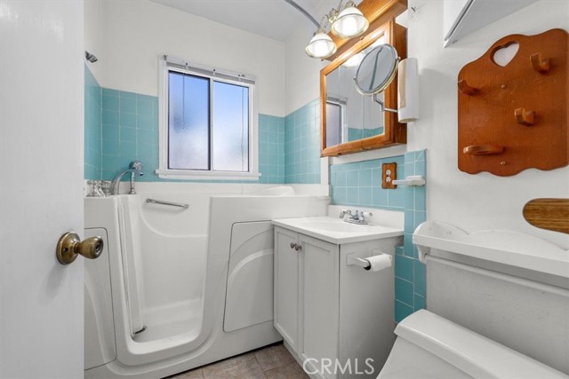 Bathroom with walk in tub