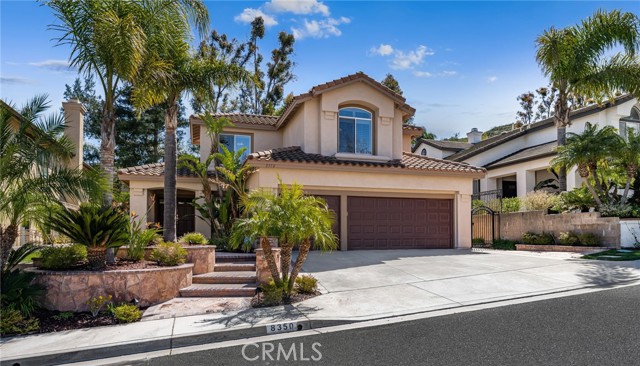 Welcome to 8350 Shining Star Court. This lovely 4 bedroom / 3 bath home is nestled on a cul-de-sac in the quiet and tranquil Summit Community of Anaheim Hills. The raised entry invites you into a spacious living area with vaulted ceilings, windows that allow the beauty of natural light to fill the room and French doors that open to the backyard.  The remodeled kitchen is a chef's delight. Double ovens, 6 burner gas stove, microwave drawer, built in wine fridge and enough storage for all your kitchen gadgets and specialty foods. There is a separate area to set up a customized coffee or wine bar. The private backyard is nicely landscaped and a wonderful and inviting backdrop for entertaining family and friends. Downstairs also consists of an office/bedroom, bathroom with shower, and laundry room. There is direct access from the 3 car garage into the home. Upstairs the primary bedroom is spacious and private. Lots of closet and storage space. The primary bath features double sinks, a jetted tub, separate shower and private water closet. There are 2 additional bedrooms and a full bathroom.  The upgraded HVAC was installed in 2023. A new water heater in 2024 and LVP flooring in 2021. This property offers the peace and quiet from a busy lifestyle yet provides easy access to shopping, restaurants and freeways, giving you the best of both worlds.