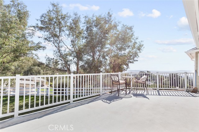 Upstairs deck with access from guest bedroom 1 + primary suite