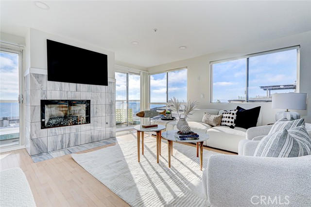 On the top floor this spacious living area features indoor/outdoor living with an expansive viewing deck.