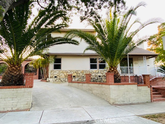 2102 Yorkshire Avenue Santa Monica, California Turnkey property, recently remodeled, corner lot, arc driveway and separate rear unit remodeled kitchen with L/G appliances, including refrigerator, newer flooring, remodeled bathroom and separate laundry area with washer and dryer. The front house features living room with fireplace, separate dining room, three bedrooms and two full bathrooms, hardwood floors, clean large kitchen, new cooktop, separate eating area, laundry area with washer and dryer, fresh paint interior and exterior, recessed lighting, hardwood floors, remodeled bathrooms, large downstairs master bedroom connects to private interior patio with spa and cascading waterfall. Timeless masonry exterior hardscape, large fenced front yard and rear patio combined with the large lot 8800 sq ft make this a unique and desirable property. The Pico District is a walk, bike or skate to neighboring Downtown/Third Street Promenade, Mid-City, Ocean Park, Santa Monica Pier Area/Ocean Avenue, Sawtelle, Sunset Park. Value & Max potential here. Lot size 8800 sq ft.