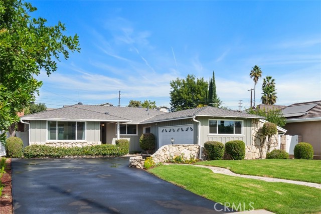 Newly painted and remodeled home on large lot with large resurfaced driveway and two-car garage!