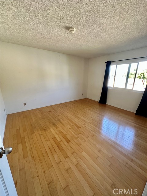 LARGE 2ND BEDROOM WITH MAPLE FLOORS