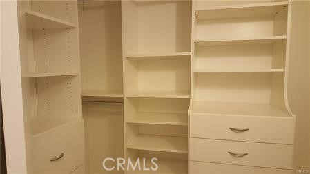 Walk-in Closet in Primary Bedroom with California Closet Builtins