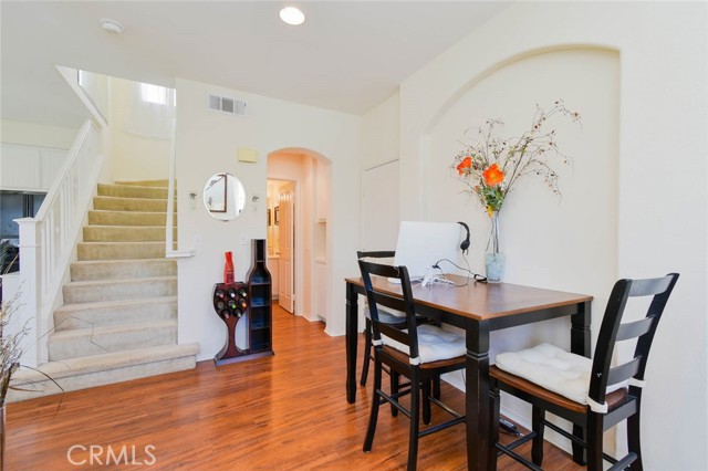 The dining room flows into either the staircase or the half bathroom with the direct access to the garage.
