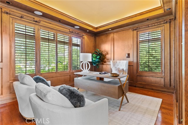 Class wood-panled office.