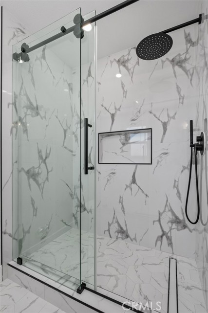 Showers ready with rainfall and hand showerheads.