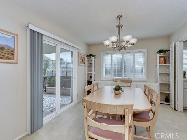 Dining room with sliding door to patio and window view