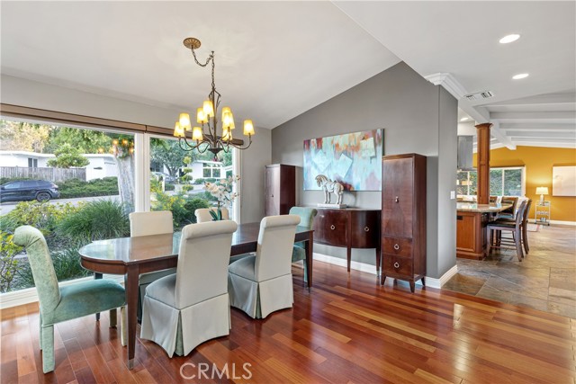 The formal dining room is a wonderful space with tall picture windows providing an elegant setting for your formal dining and entertaining.