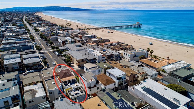 201 15th Street Manhattan Beach, California Prime Downtown Manhattan Beach location, this well maintained triplex is situated on 15th Street where Manhattan Avenue ends. Only steps to the beach, restaurants, shops and the famous MB Pier! Incredible large back deck for entertaining and sun bathing. Situated on a full street to alley lot. Hard to find this type of property, a unique opportunity! Check out the attached video next to map.
