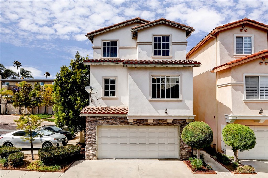 700 Meyer Lane 16 Redondo Beach, California This pristine Redondo Beach SFR-D, detached townhome with 2,202 square feet, 3 bedrooms and 2 1/2 baths is located just 5 minutes from the ocean in a much sought-after gated community. Upon entry, experience impressive soaring ceilings, modern-transitional design features and hardwood floors throughout. Relax by the beautiful fireplace and enjoy abundant natural light- courtesy of oversized sliding glass arch-top doors. Just up a short flight of stairs, the kitchen and dining area offer an ideal environment for the aspiring chef. The kitchen boasts granite counters, island and breakfast bar, cook-top stove, and stainless appliances. The family room adjacent to your kitchen is the ideal space for TV and media entertainment. Step out to relax on your private patio. After dinner, retire upstairs to the generous-sized main/primary bedroom with an over-sized walk-in closet and graciously appointed en suite bath. Two more sizable bedrooms, two baths, and a direct entry two-car garage complete this spacious open-concept floor plan. Make your home in this private gated community, located close to trendy restaurants, shopping centers, schools and all that the South Bay has to offer! Has lots of storage and an oversized laundry room. This home is in the very desirable Redondo Beach school system. This is an end unit that is very quiet and private, with abundant natural light.