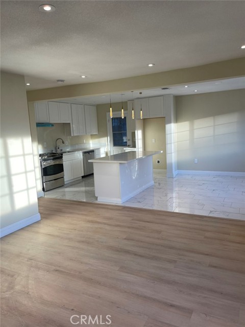 VIEW OF KITCHEN FROM FAMILY ROOM