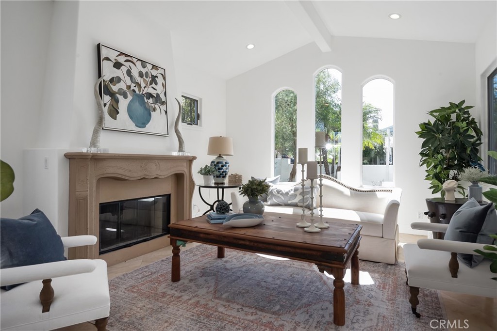 561 33rd Street Manhattan Beach, California MONTECITO MAGIC: Charming tree lined block in Tree Section you'll find a beautifully renovated 5 bedroom 6 bathroom family home. The interior and exterior of this home have had a complete, crisp refresh including natural oak floors, fresh paint, and brand-new lighting throughout. The formal living room features vaulted ceilings and triple tall arched windows that allow natural light to pour in and provides a beautiful view of the front yard with a happy olive tree. Just past the formal dining room is the open concept kitchen and family room. New features of this kitchen have been skillfully selected to match the Modern Montecito feel – new quartz countertops, baked tile backsplash, dark oiled bronze Emtek hardware, and gorgeous Hinkley pendant light fixtures over the island. Don’t miss the massive step-down pantry with plenty of space for all your cooking essentials. The heart of the home flows around an expansive center courtyard with 2 sets of French doors that allow that indoor/outdoor living. Upstairs you’ll find 4 bedrooms with ensuite bathrooms including a massive 500' Master Suite with a beautiful accent wall and private patio. The fifth bedroom with ensuite bathroom can be found downstairs set away from main liviing area, perfect for an office or guest suite. This stunner sits on a 5400' street to alley lot and includes a 3-car garage. Steps to the pocket park, walk to beach, chip path, downtown, uptown and a quick 12 minute drive to LAX – this home really has it all.