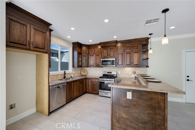 Stainless appliances are featured in this kitchen.