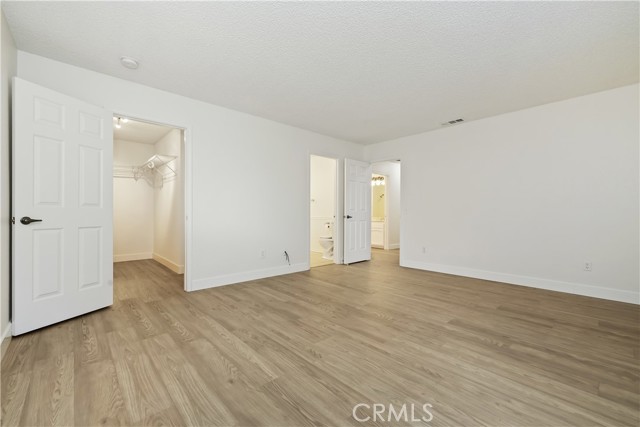 Primary looking to closet and bath
